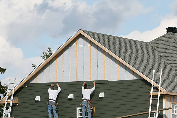 Professional Siding Replacement technician working in Perrysville, OH